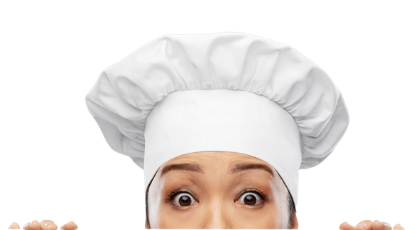 A chef peeks over the top with their eyes